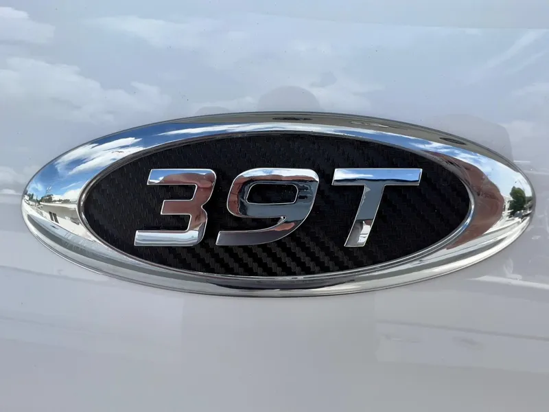 Slide: The Image of 2025 Cape Horn 39 T emblem with chrome finish on a white background. - 1