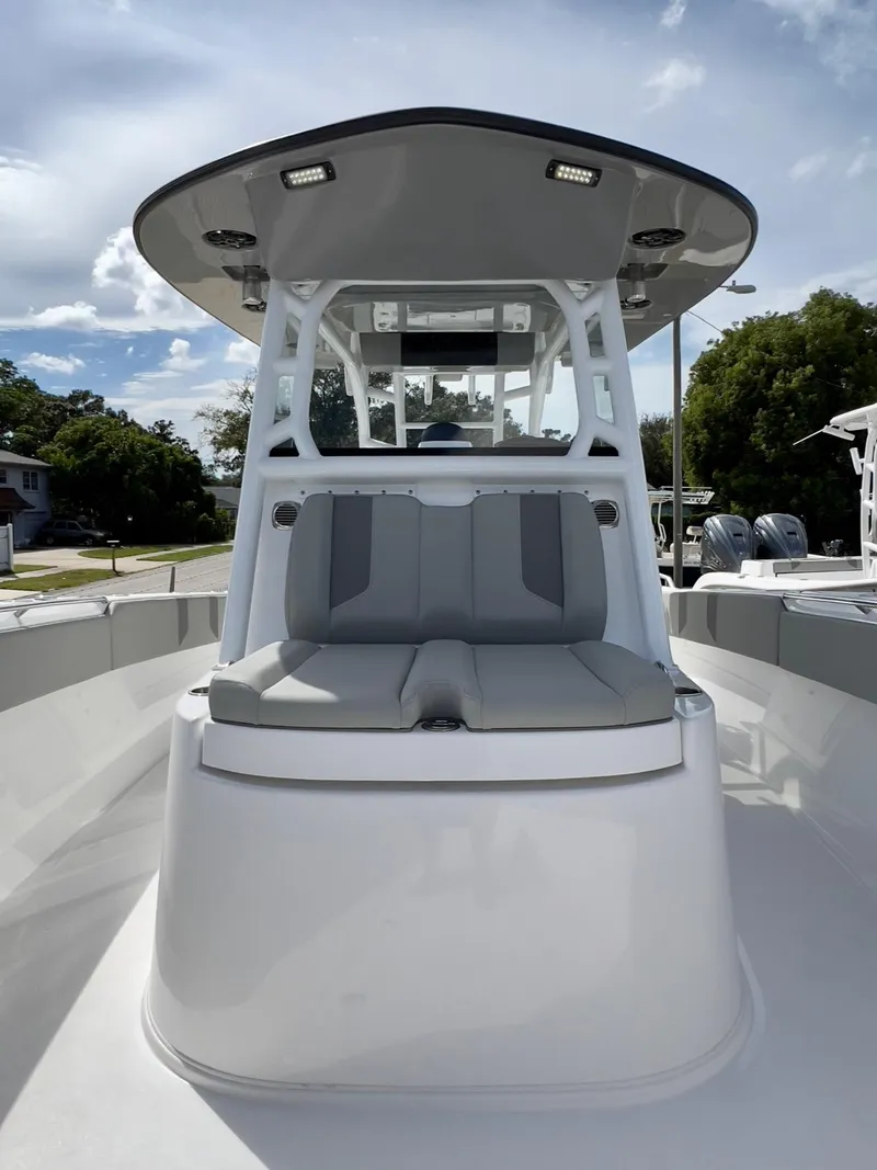 Slide: The Image of 2025 Cape Horn 39 T boat with sleek design and spacious seating under a clear sky. - 13