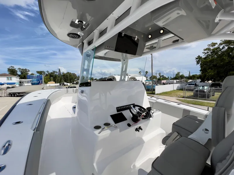 Slide: The Image of 2025 Cape Horn 39 T boat interior with modern helm and seating. - 17