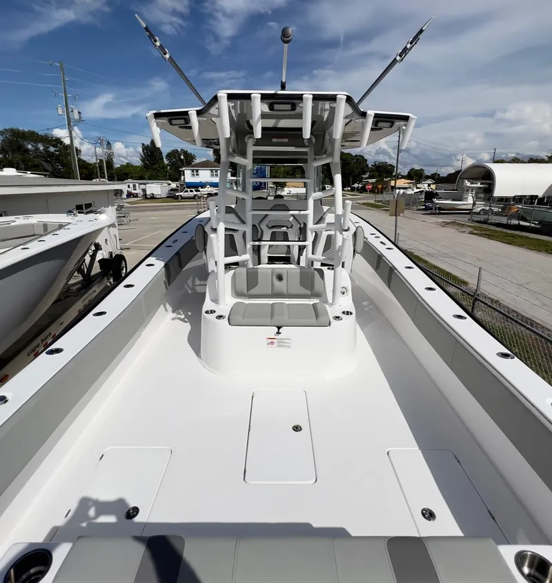 Slide: The Image of 2025 Cape Horn 39 T boat, spacious deck, modern design, clear sky background. - 31