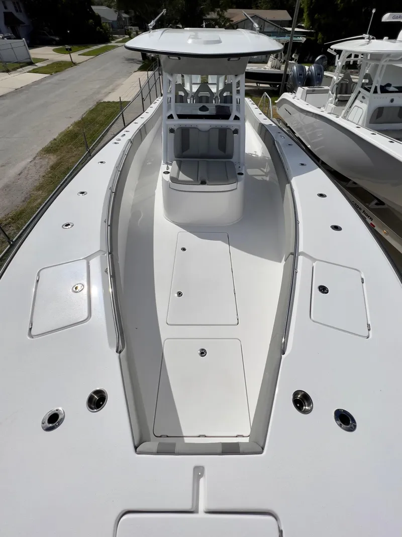Slide: The Image of 2025 Cape Horn 39 T boat, sleek design, spacious deck, center console, modern features. - 8