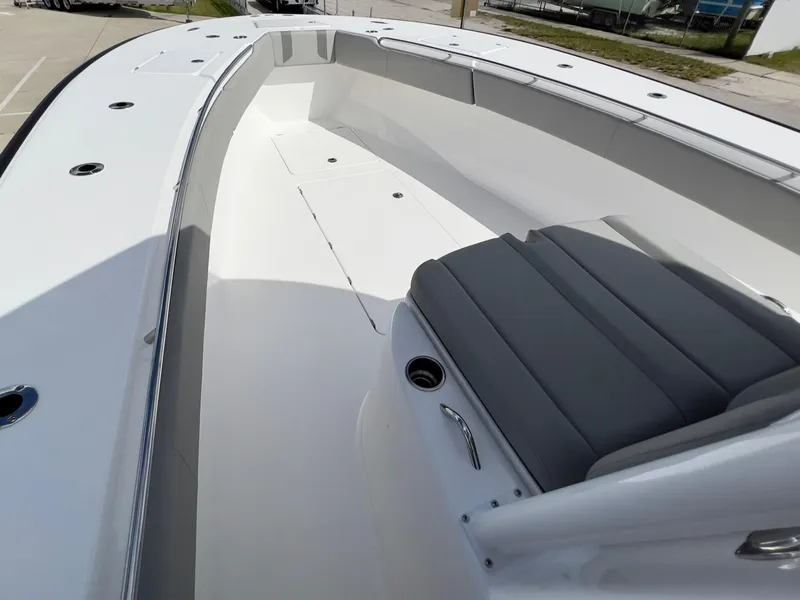 Slide: The Image of 2025 Cape Horn 39 T boat interior with sleek seating and spacious deck design. - 11