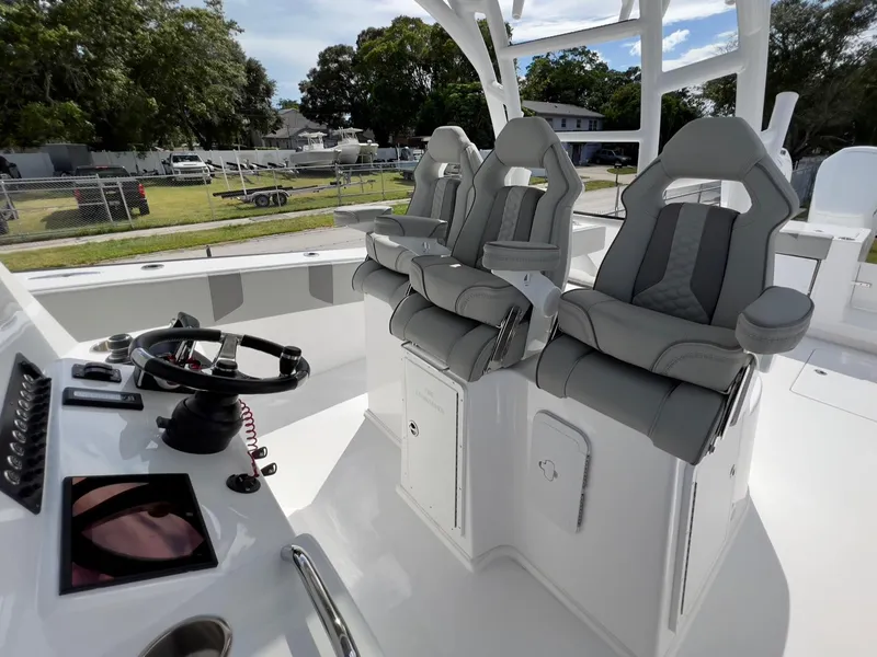 Slide: The Image of 2025 Cape Horn 39 T boat interior with modern helm and comfortable seating. - 24