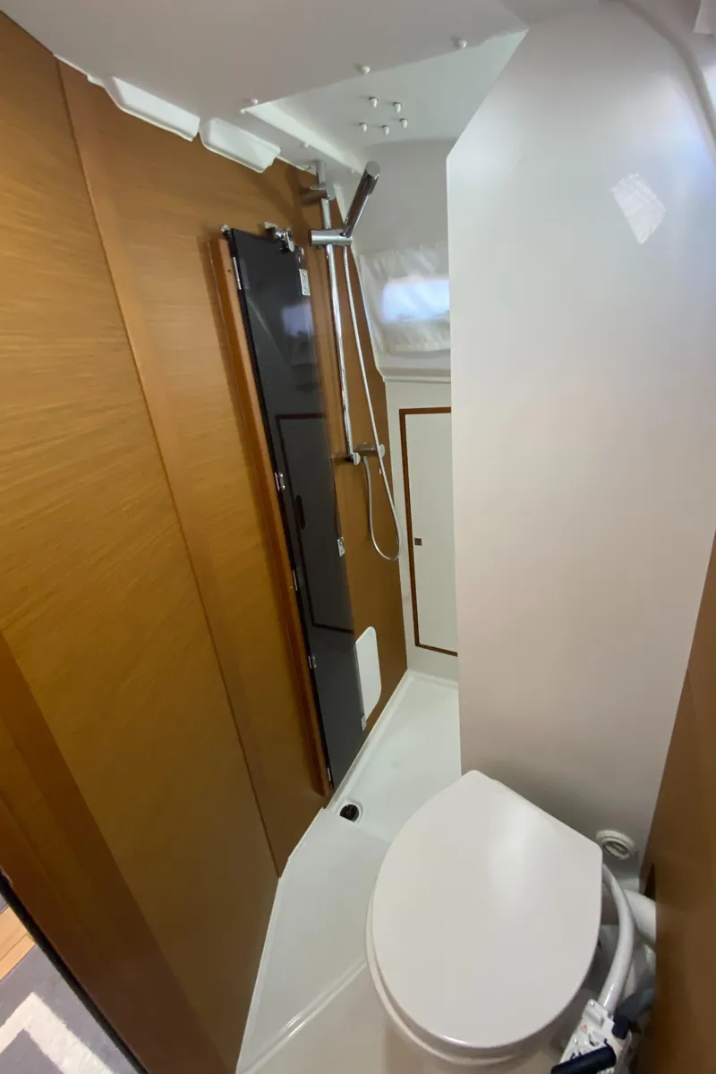 Slide: The Image of 2023 Jeanneau Sun Odyssey 349 yacht bathroom with shower and toilet. - 26