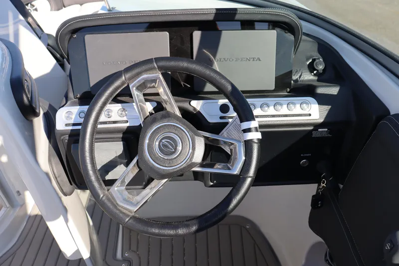 Slide: The Image of 2024 Crownline Eclipse E255 SURF engine, 300 V8, with warning label and components. - 11