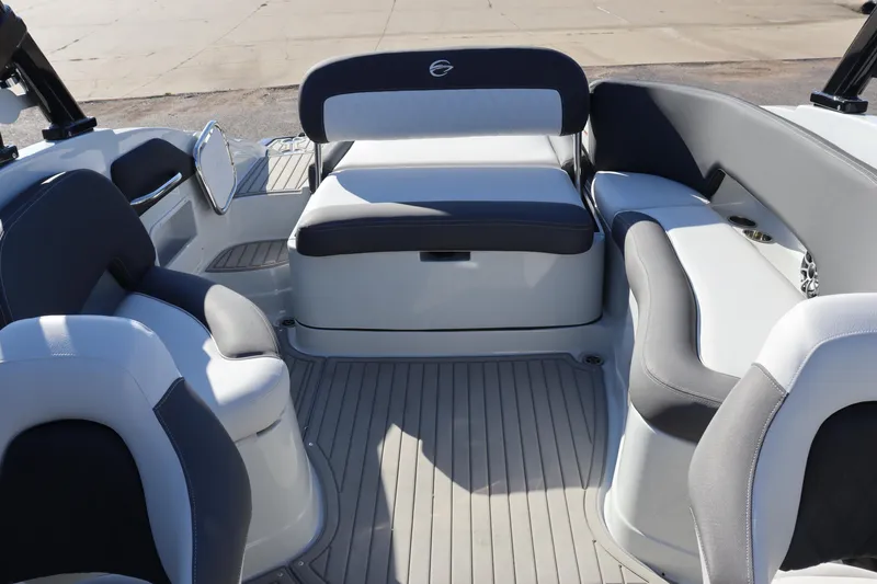 Slide: The Image of 2024 Crownline Eclipse E255 SURF boat interior seating with modern design and ambient lighting. - 17