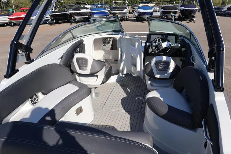 Slide: The Image of 2024 Crownline Eclipse E255 SURF boat interior with luxurious seating. - 9
