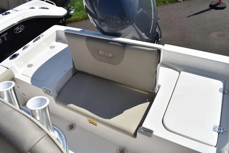 Slide: The Image of 2024 Key West 179 FS boat seating and storage area. - 14