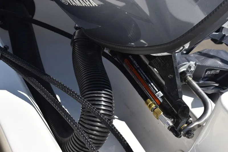 Slide: The Image of Close-up of 2024 Key West 179 FS boat engine components and cables. - 21