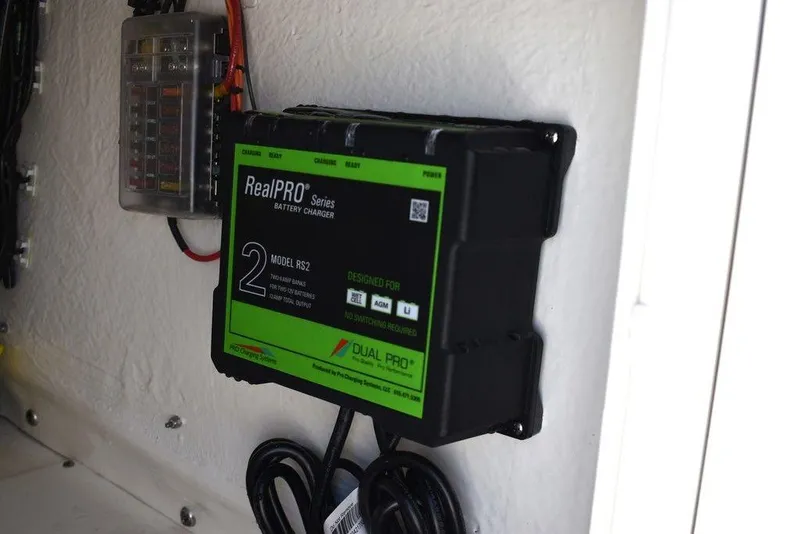 Slide: The Image of RealPRO battery charger in 2024 Key West 179 FS boat. - 24