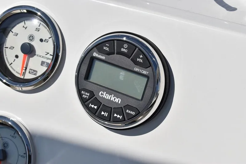 Slide: The Image of Clarion audio system on 2024 Key West 179 FS boat dashboard. - 30