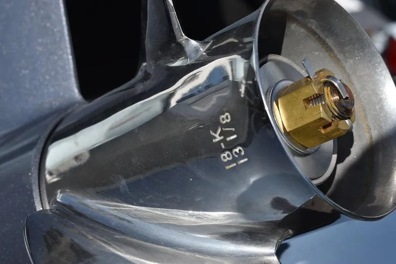 Slide: The Image of Close-up of a 2024 Key West 179 FS boat propeller with engraved specifications. - 36
