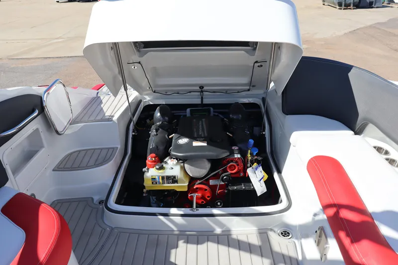 Slide: The Image of 2024 Crownline 260SS SURF boat engine compartment with open hatch. - 23