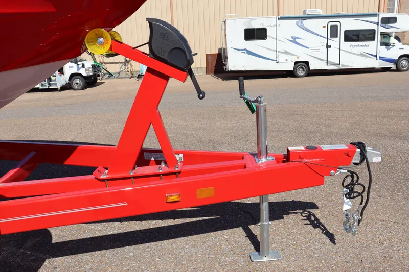Slide: The Image of 2024 Crownline 260SS SURF boat trailer with red frame and winch. - 26