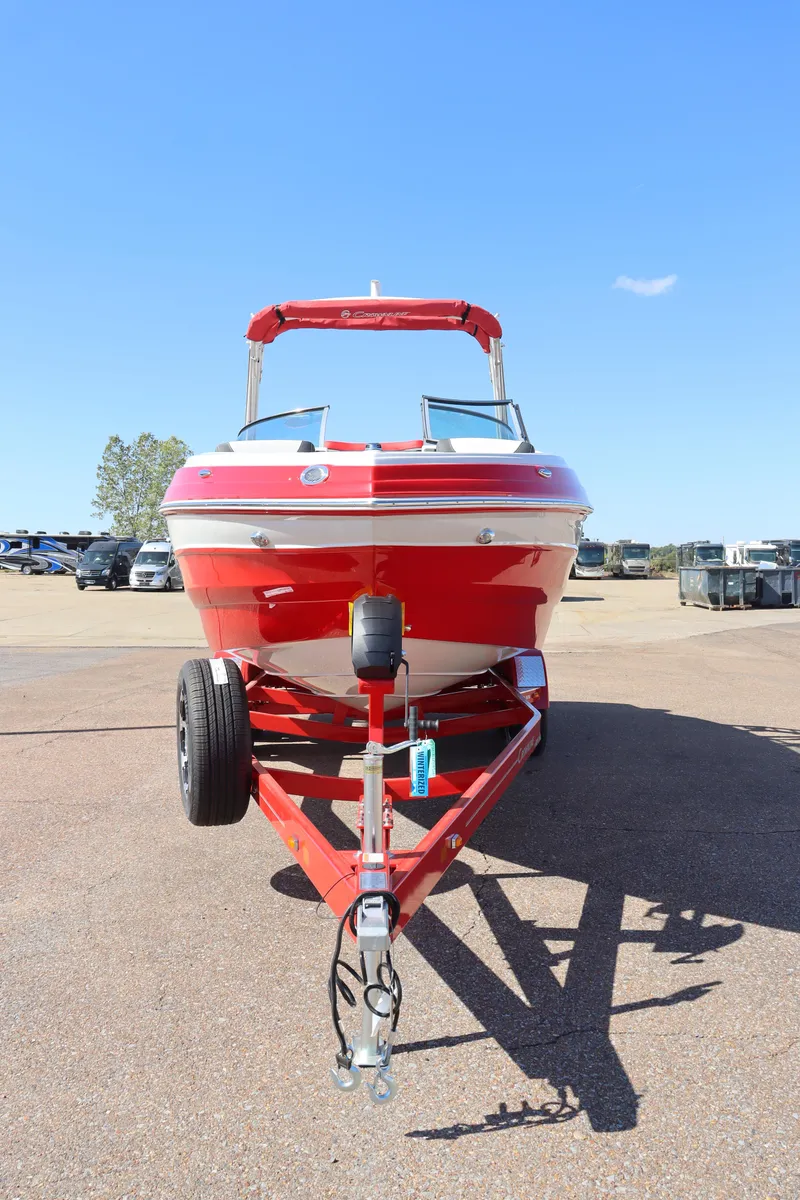 Slide: The Image of 2024 Crownline 260SS SURF boat on trailer, front view. - 4