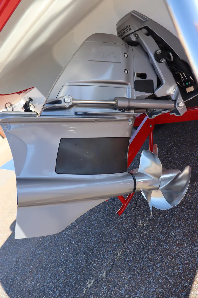 Slide: The Image of 2024 Crownline 260SS SURF boat propeller and outdrive close-up. - 9