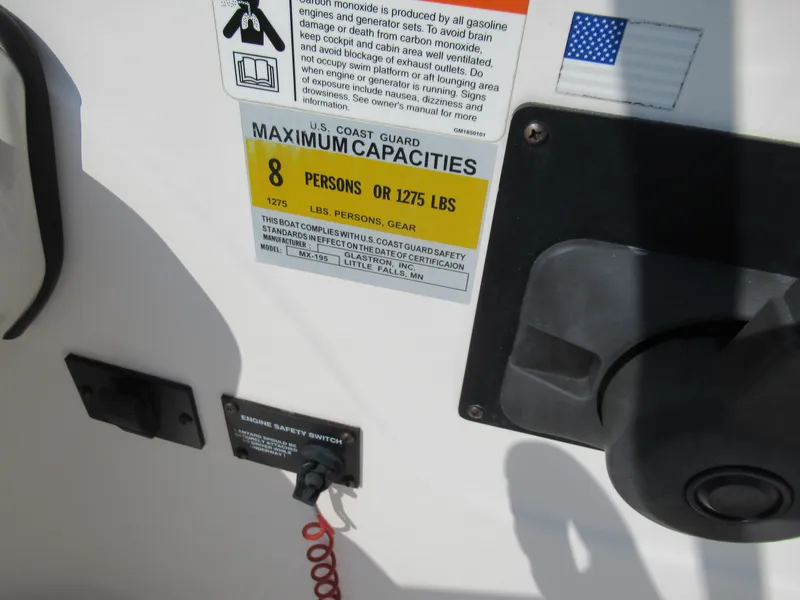 Slide: The Image of 2006 Glastron MX 195 boat capacity label, showing maximum 8 persons or 1275 lbs. - 14