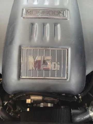 Slide: The Image of 2024 Axis Wake Research A20 Monsoon M5Di engine close-up. - 13