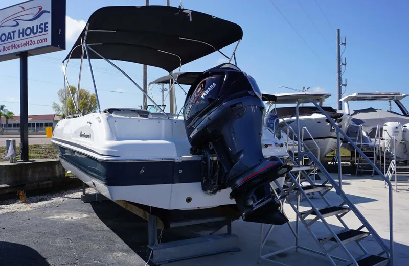 Slide: The Image of 2024 Hurricane 231 SS boat with Yamaha outboard motor at Boat House dealership. - 12