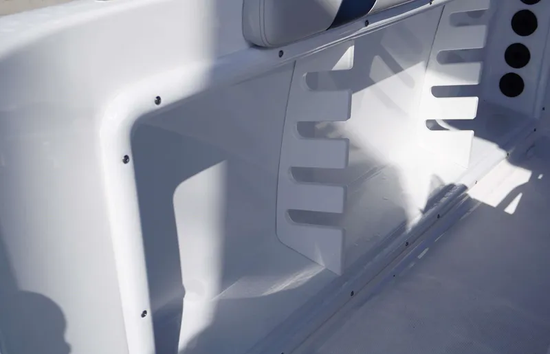 Slide: The Image of 2024 Hurricane 231 SS boat interior detail with storage compartments. - 3