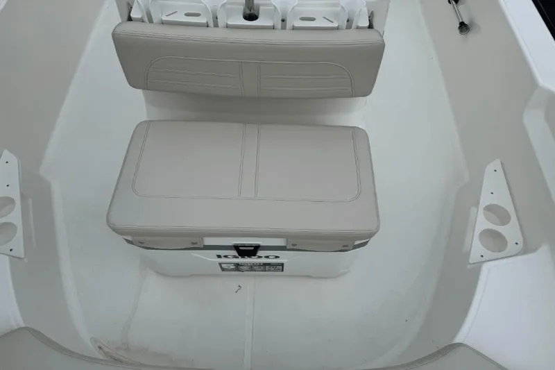 Slide: The Image of 2024 Boston Whaler 170 Montauk boat seating and storage area. - 13