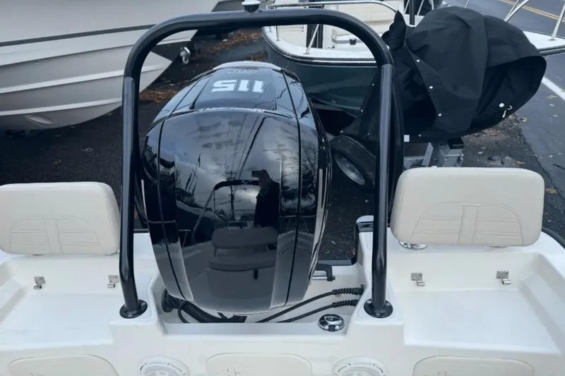 Slide: The Image of 2024 Boston Whaler 170 Montauk boat with a 115 HP outboard motor. - 5