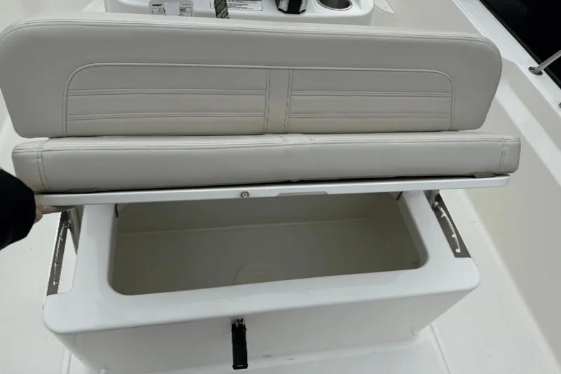 Slide: The Image of 2024 Boston Whaler 170 Montauk boat seat with storage compartment. - 8