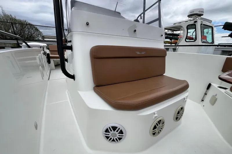 Slide: The Image of 2020 Beneteau Flyer 8 SPACEdeck boat interior with brown seating and white deck. - 16