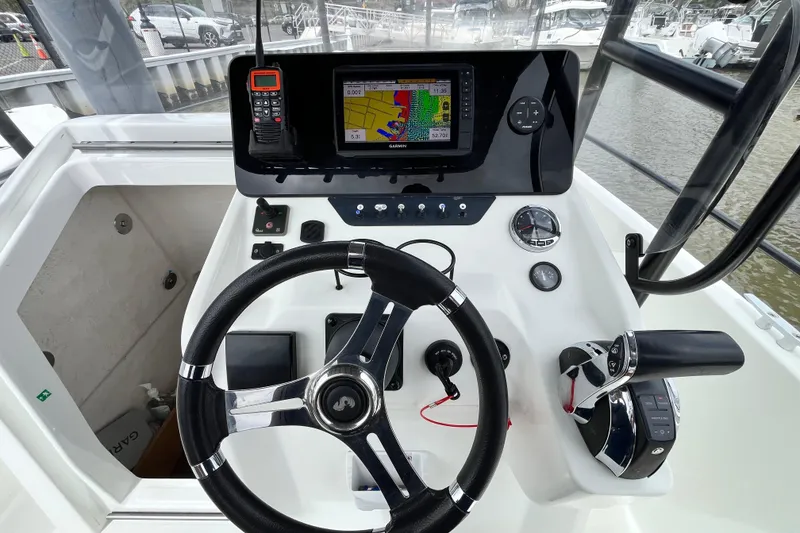 Slide: The Image of Control panel of 2020 Beneteau Flyer 8 SPACEdeck with steering wheel and navigation display. - 19