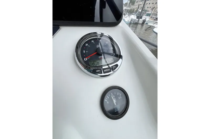 Slide: The Image of Dashboard of 2020 Beneteau Flyer 8 SPACEdeck with RPM and fuel gauges. - 24