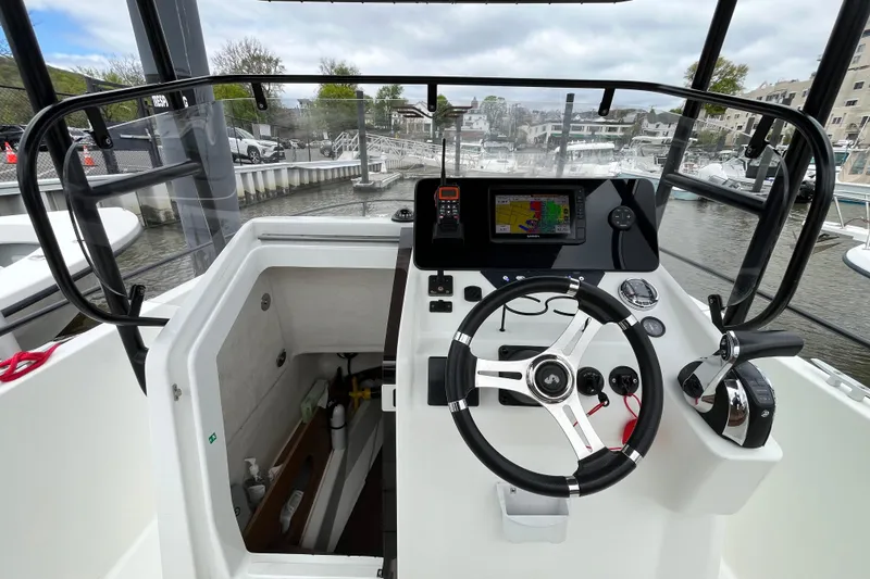 Slide: The Image of Cockpit of 2020 Beneteau Flyer 8 SPACEdeck with steering wheel and navigation display. - 27