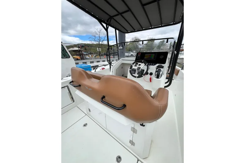 Slide: The Image of 2020 Beneteau Flyer 8 SPACEdeck boat cockpit with brown seating and modern controls. - 33