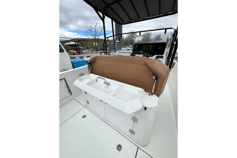 Slide: The Image of 2020 Beneteau Flyer 8 SPACEdeck boat interior with sink and seating area. - 34