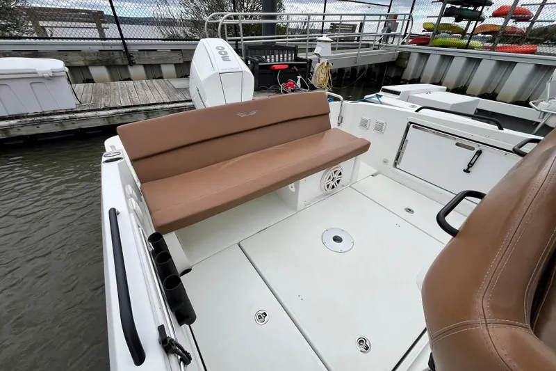 Slide: The Image of 2020 Beneteau Flyer 8 SPACEdeck boat interior with tan seating and white deck. - 35