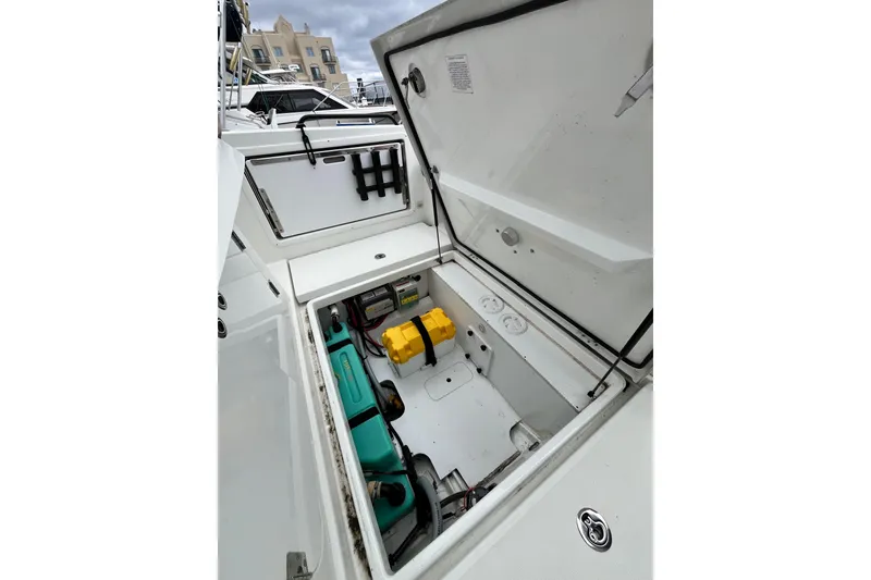 Slide: The Image of Open storage compartment of 2020 Beneteau Flyer 8 SPACEdeck boat, showcasing interior equipment. - 37