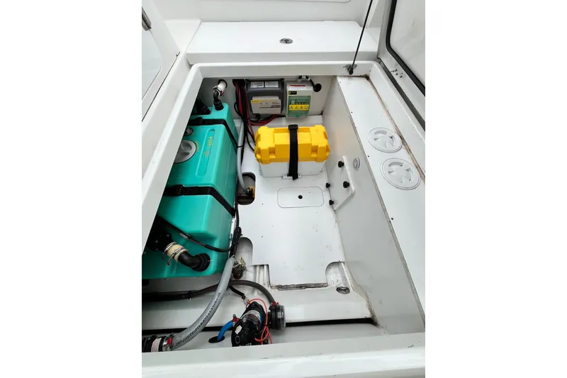 Slide: The Image of Engine compartment of 2020 Beneteau Flyer 8 SPACEdeck with battery and wiring. - 38