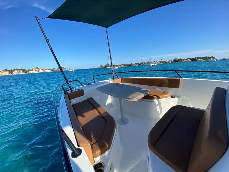 Slide: The Image of Beneteau Flyer 8 SPACEdeck 2020 on blue water, featuring seating and canopy. - 46