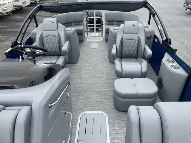 Slide: The Image of 2023 Bennington 23R pontoon boat interior with luxurious gray seating and modern design. - 7
