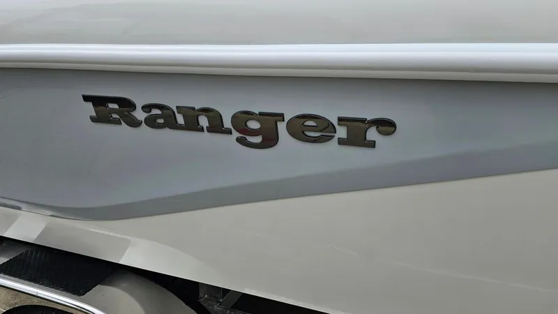 Slide: The Image of 2024 Ranger 2600 Bay boat side view with logo. - 15
