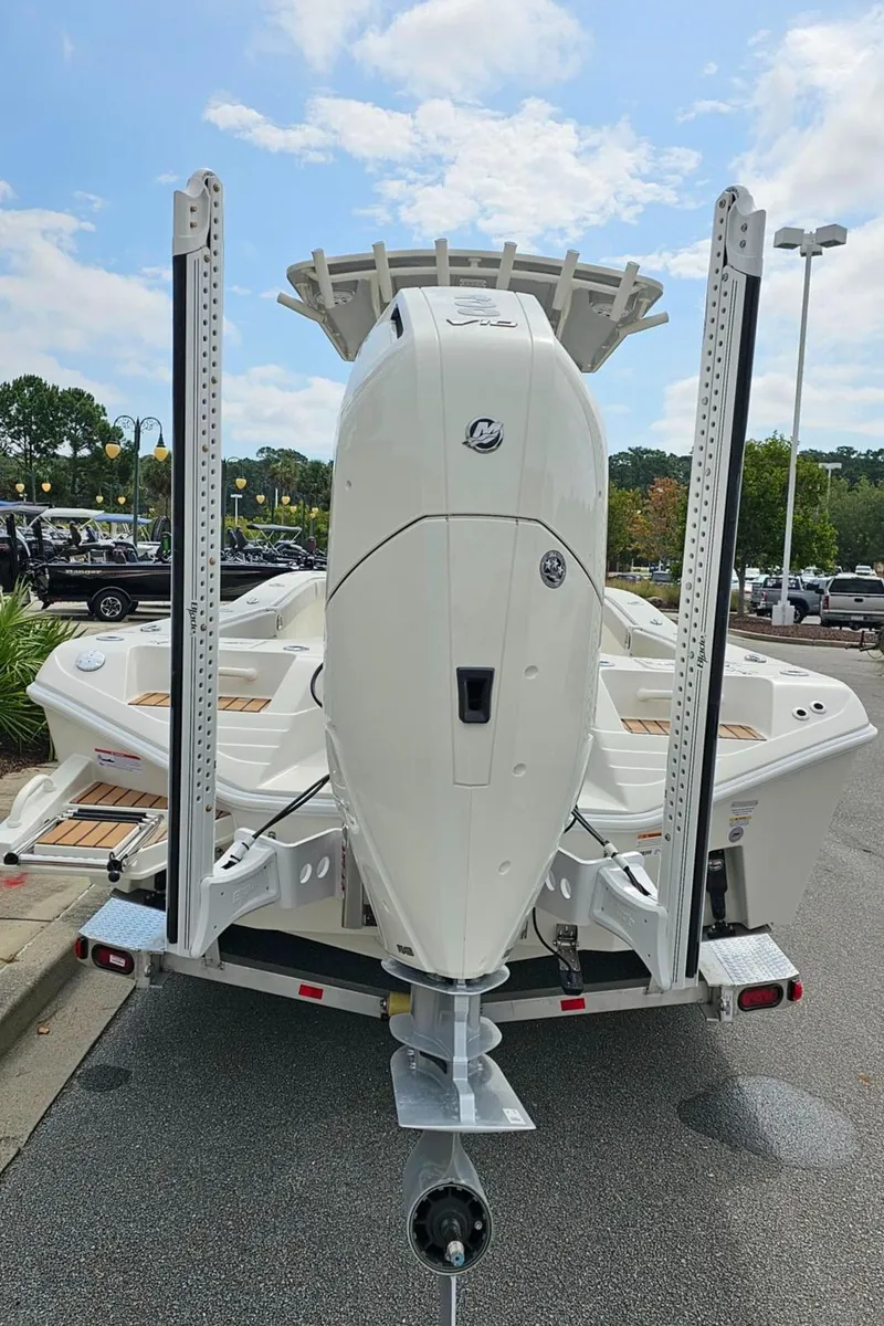 Slide: The Image of 2024 Ranger 2600 Bay boat rear view with outboard motor. - 16