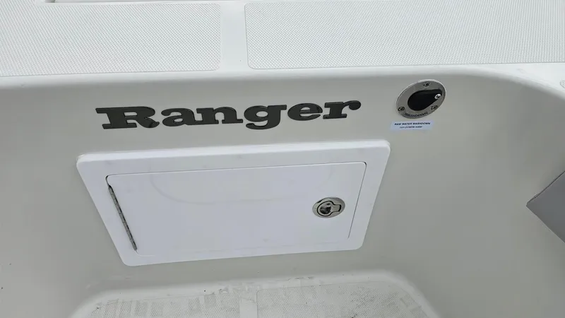 Slide: The Image of 2024 Ranger 2600 Bay boat interior with storage compartment. - 27