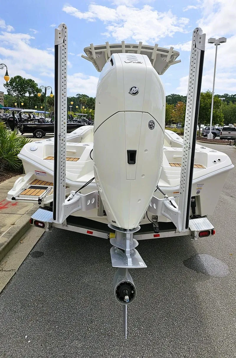 Slide: The Image of 2024 Ranger 2600 Bay boat rear view with outboard motor. - 5