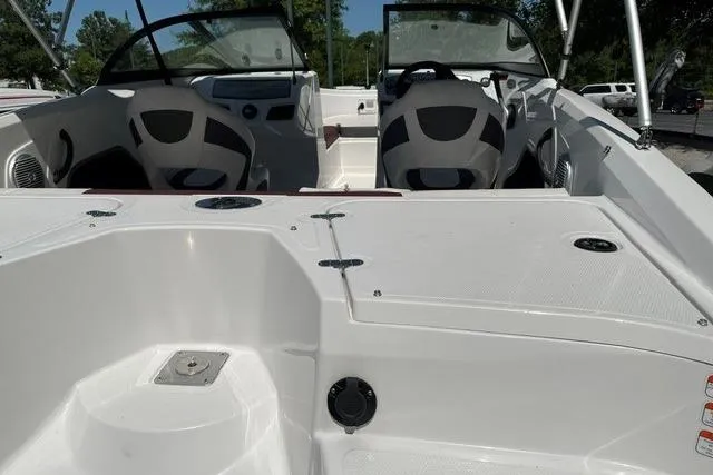 Slide: The Image of 2024 Tahoe 185 S boat interior with dual seats and dashboard, showcasing modern design. - 3