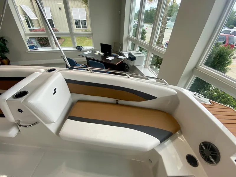 Slide: The Image of 2026 Starcraft SVX 171 boat interior with cushioned seating and modern design. - 16