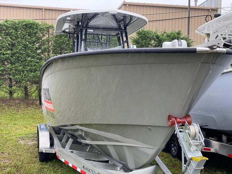 Slide: The Image of 2025 Cape Horn Yachts 32 XS on trailer, parked outdoors. - 1