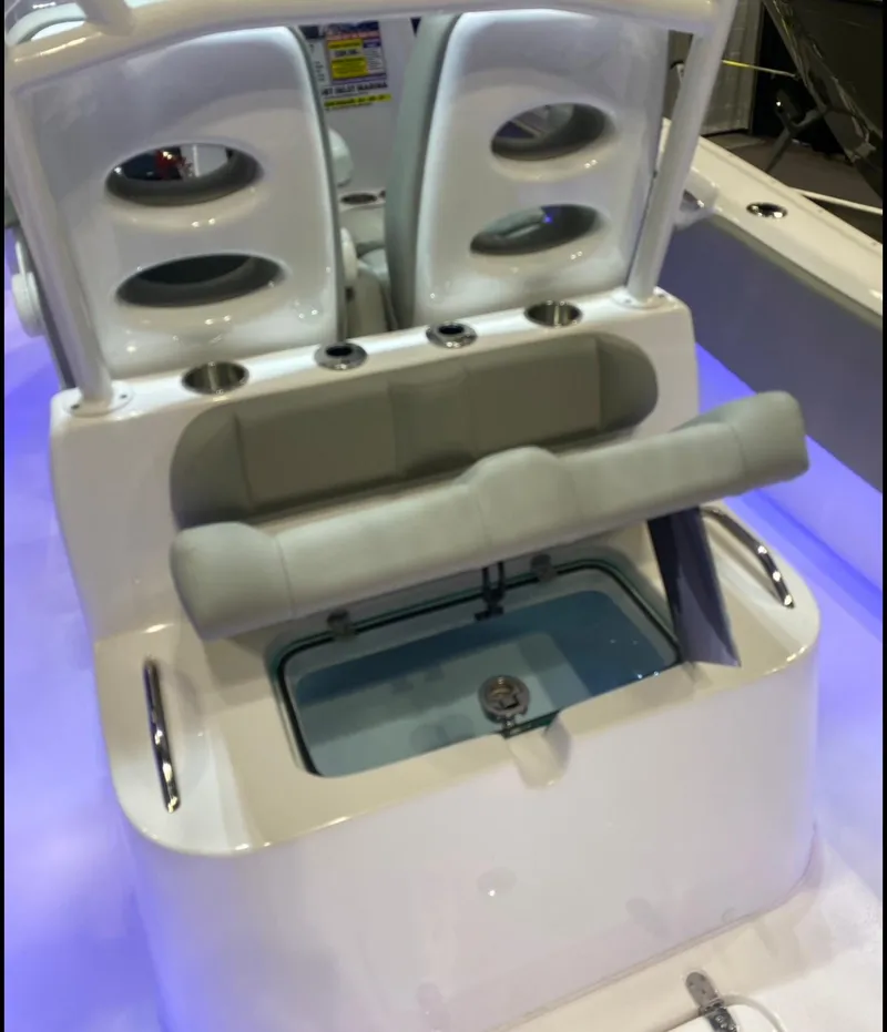Slide: The Image of 2025 Cape Horn Yachts 32 XS boat interior with seating and storage compartment. - 12