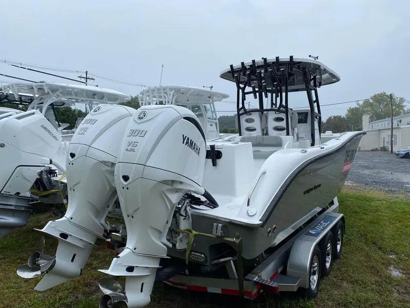 Slide: The Image of 2025 Cape Horn Yachts 32 XS with twin Yamaha 300 engines on a trailer. - 3