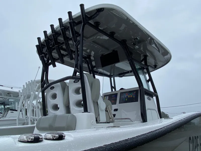 Slide: The Image of 2025 Cape Horn Yachts 32 XS boat with modern console and seating. - 8
