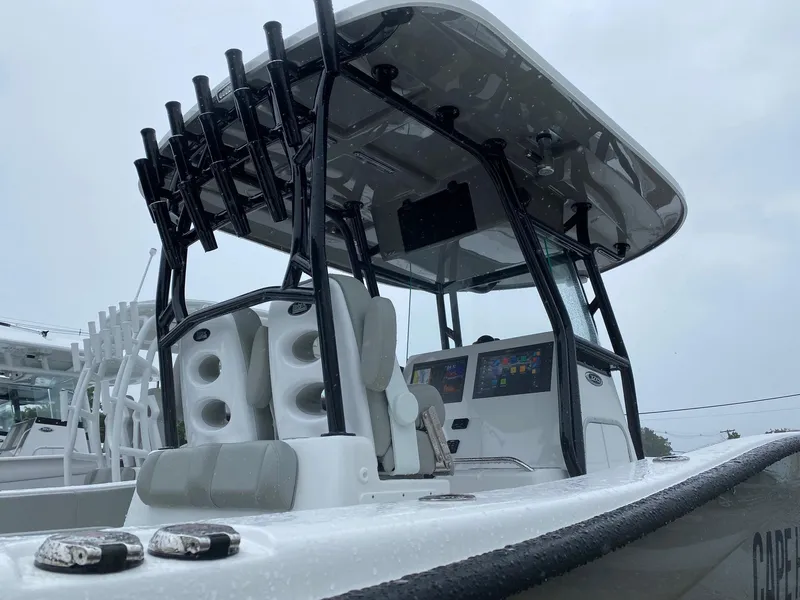 Slide: The Image of 2025 Cape Horn Yachts 32 XS center console boat with advanced navigation system. - 9