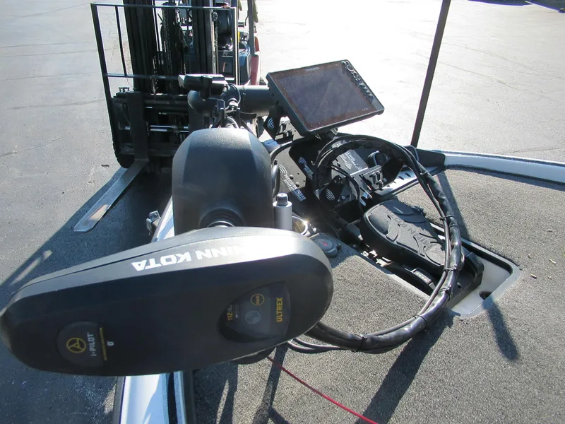 Slide: The Image of 2019 Triton 21 TrX Elite boat with Minn Kota trolling motor and navigation equipment. - 3